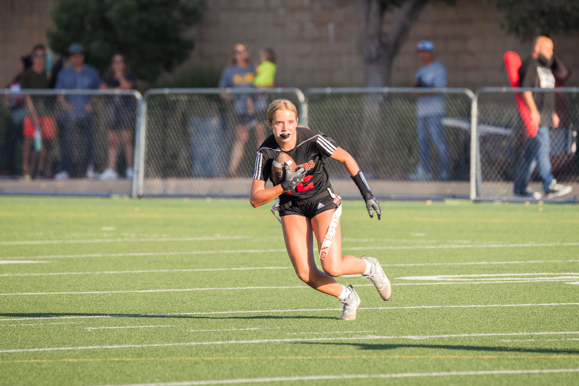 Flag football runner