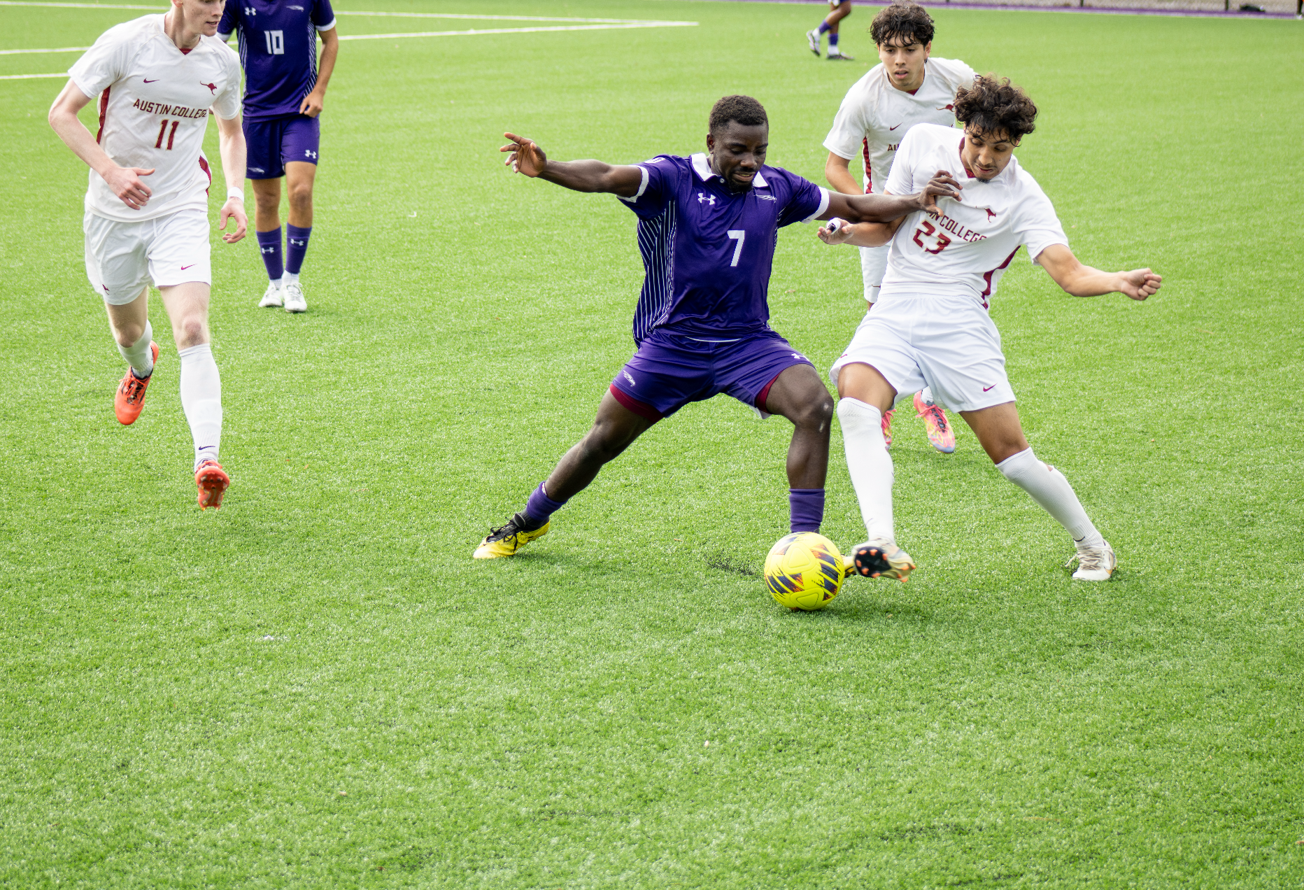 Rasto Rimbo battles for a ball.