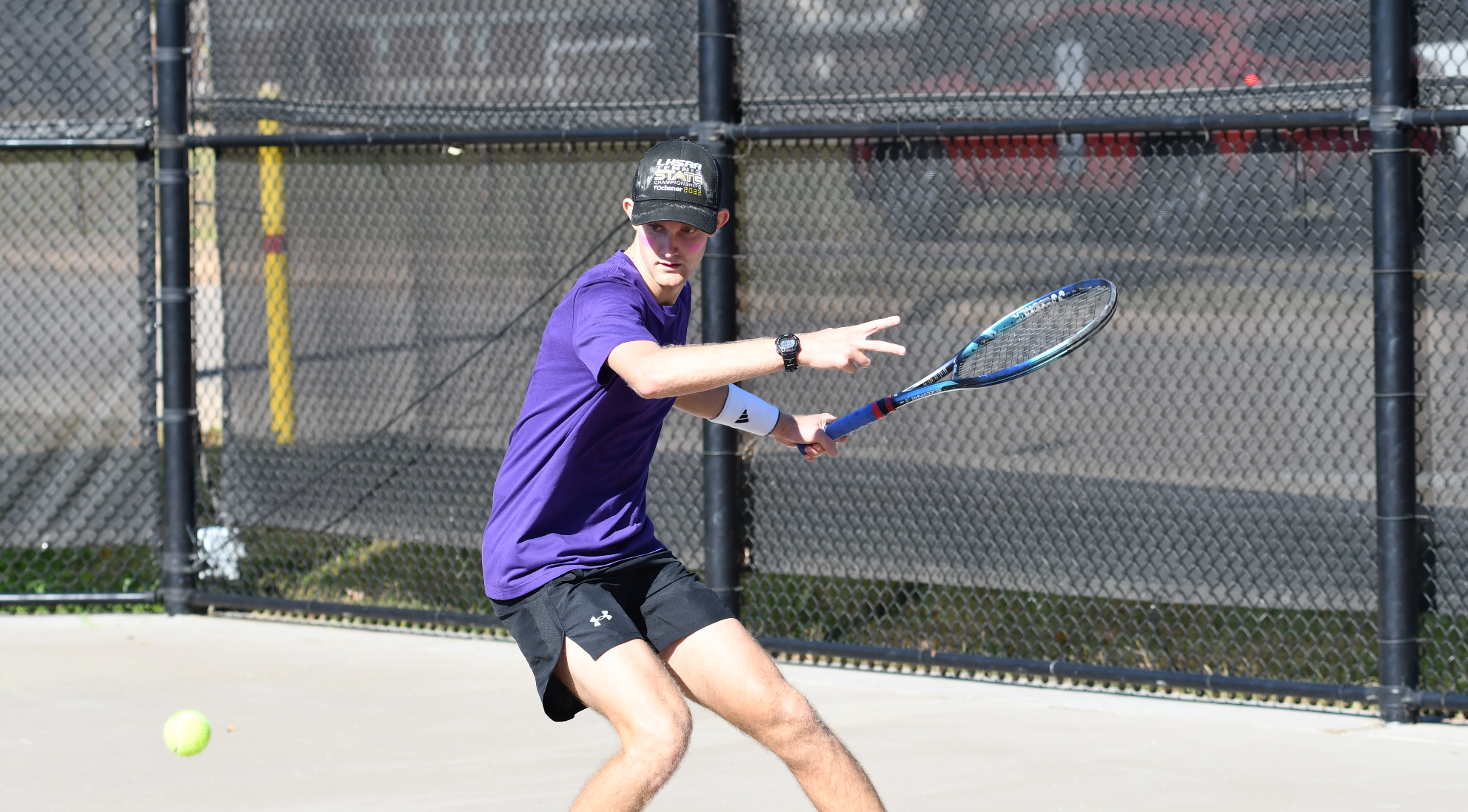 Joseph Guidry returns a ball in the fall.