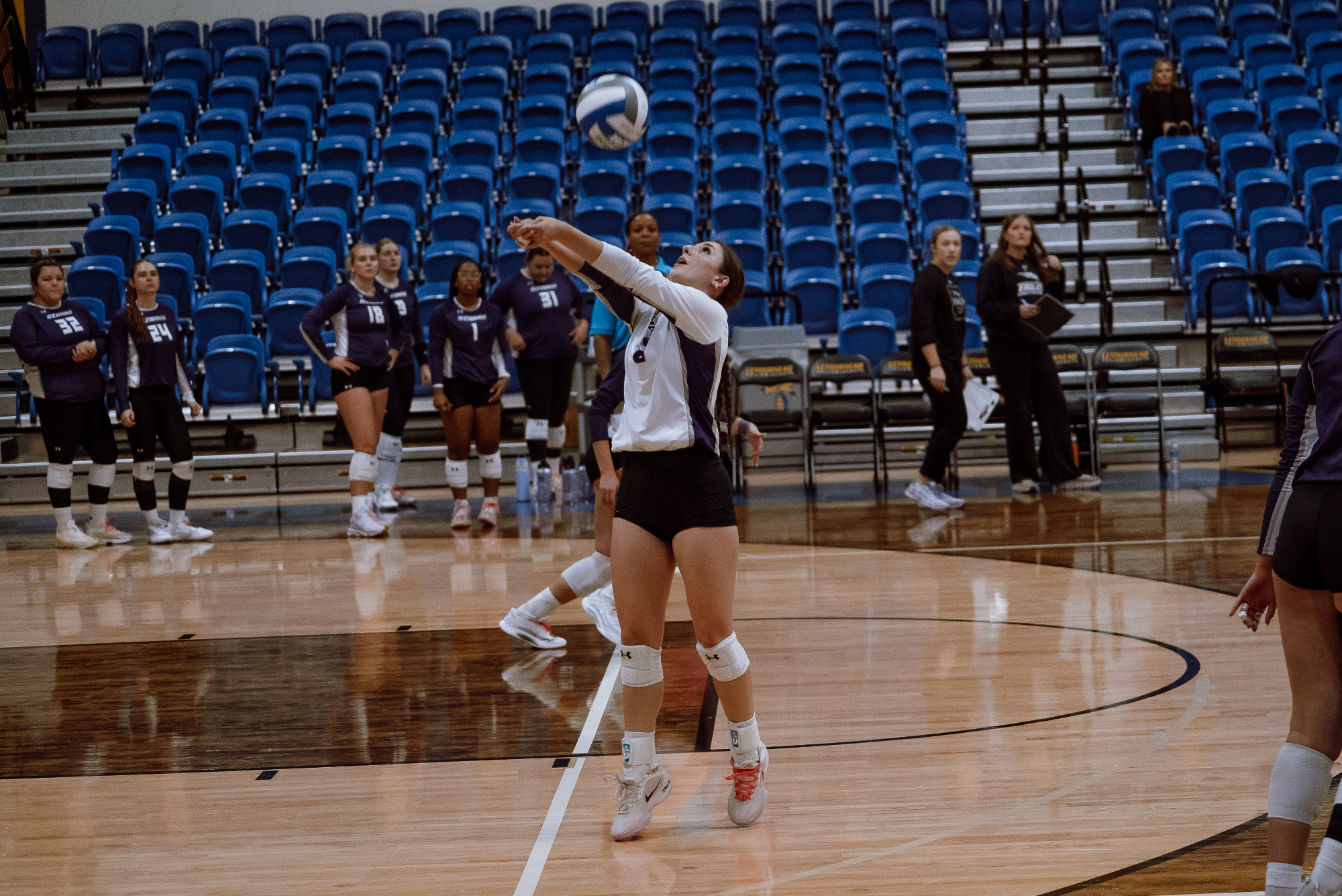 Lauralai Bradley sets a ball.