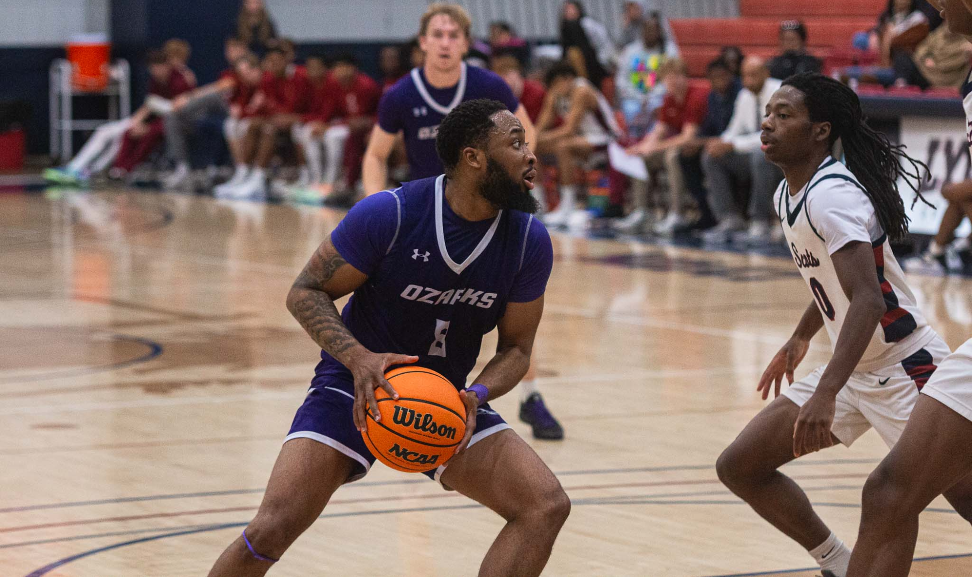 DJ Miller looks to pass against Lyon.