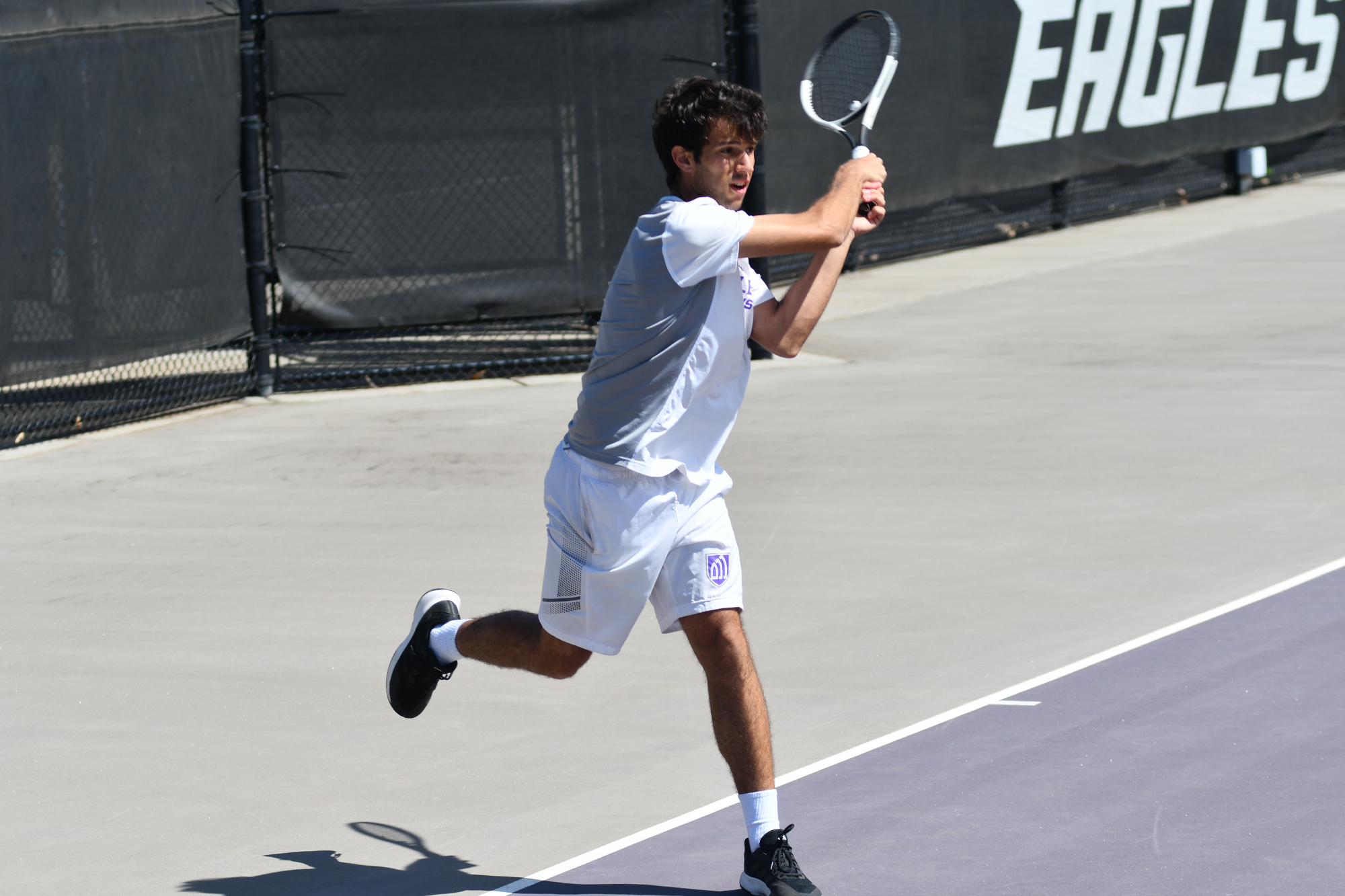 Sergio Munoz returns at ball at a home match.