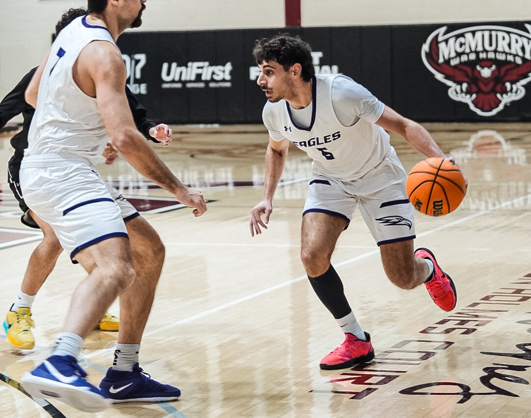 Eyal Shamri drives around a defender.