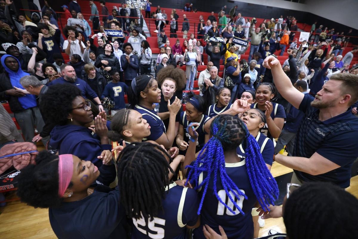 Principia celebrates defeating Highland in a Class 3 state sectional, Wednesday, March 4, 2026, at Hannibal High School in Hannibal. The final 8:54 was replayed following a scoring discrepancy when the teams played two days earlier.  Michael Gulledge, Special to the Post-Dispatch