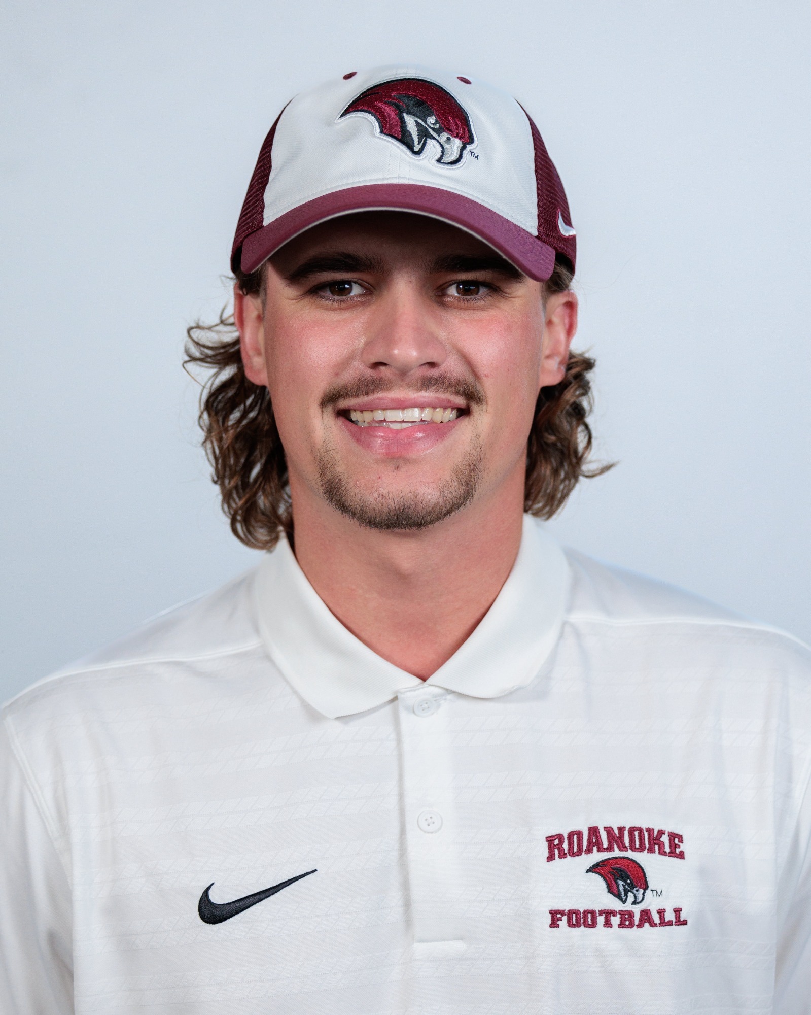 Coach Alex Kinsey