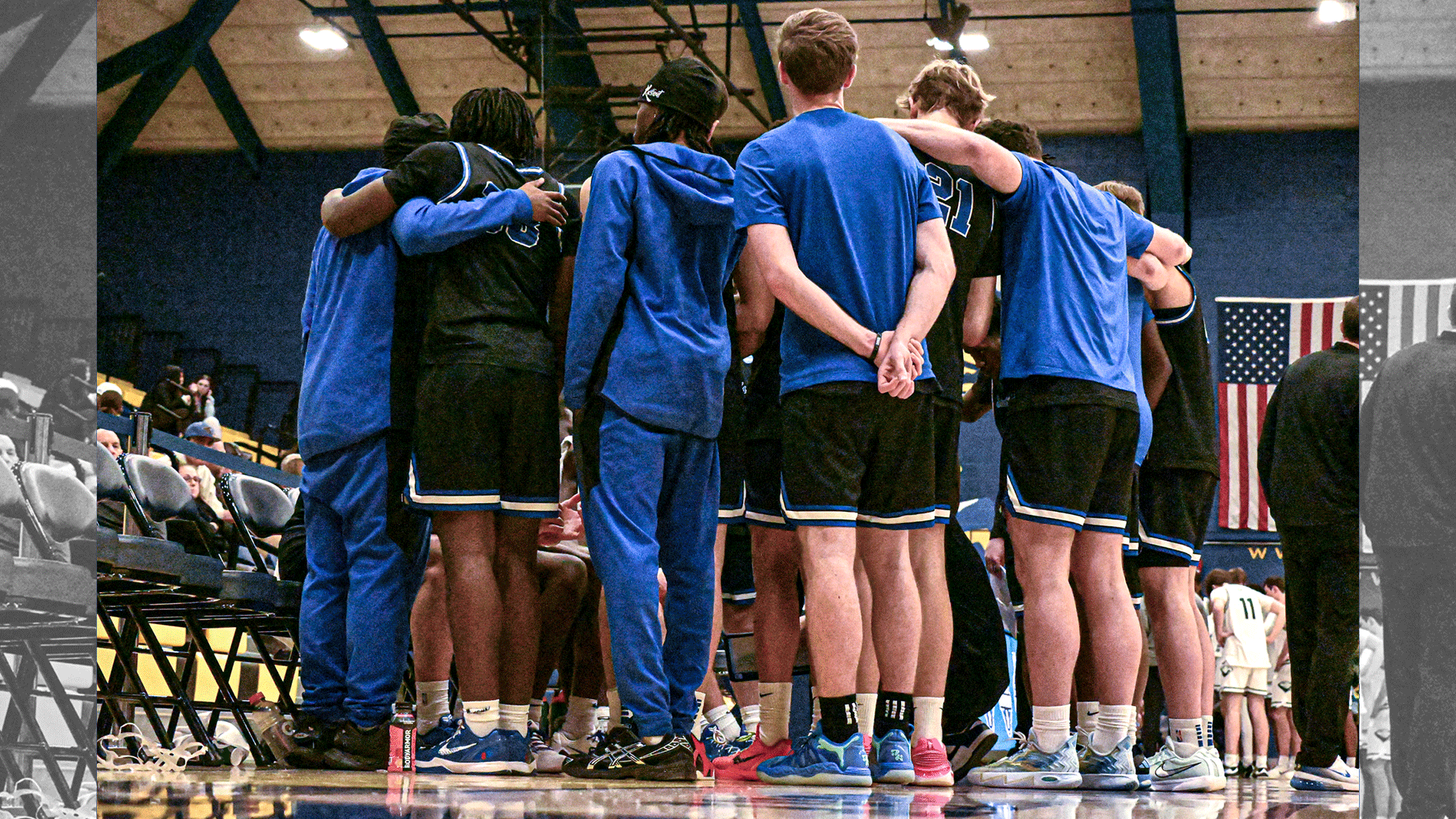 men's basketball huddle