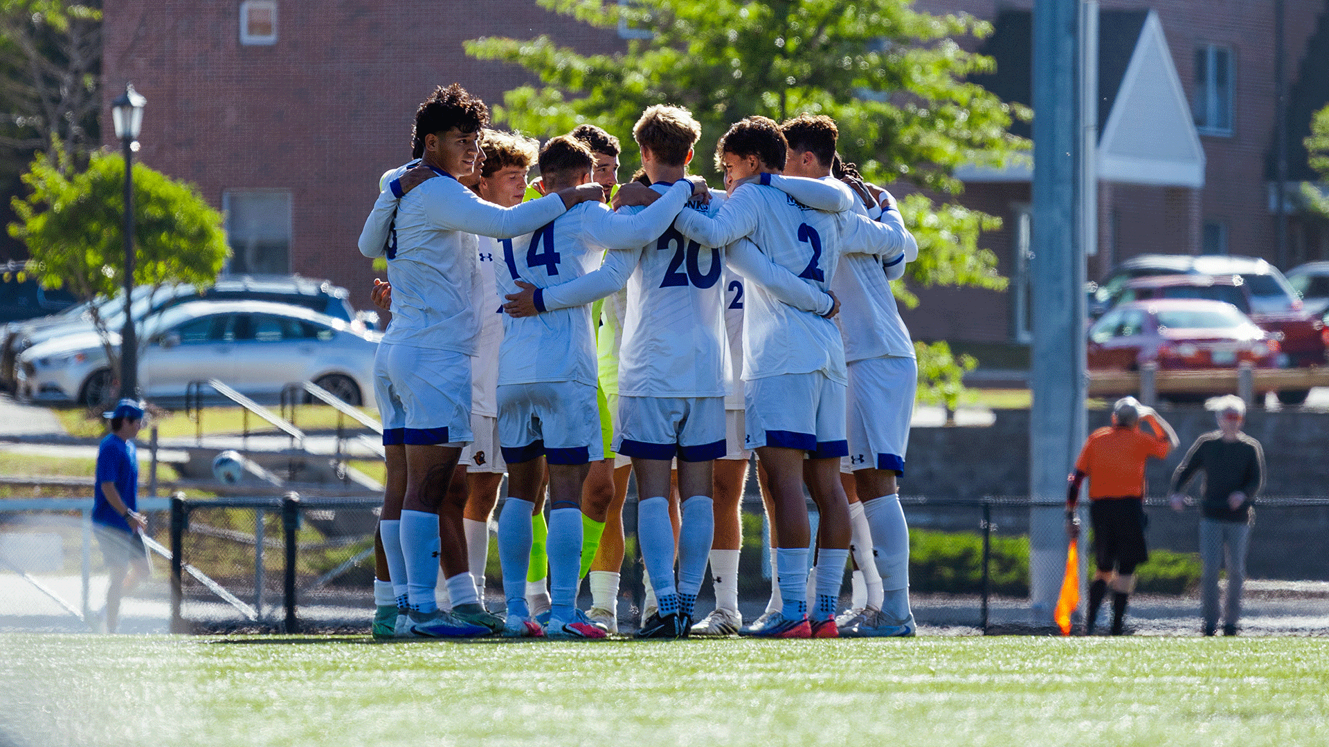 Men's soccer huddle