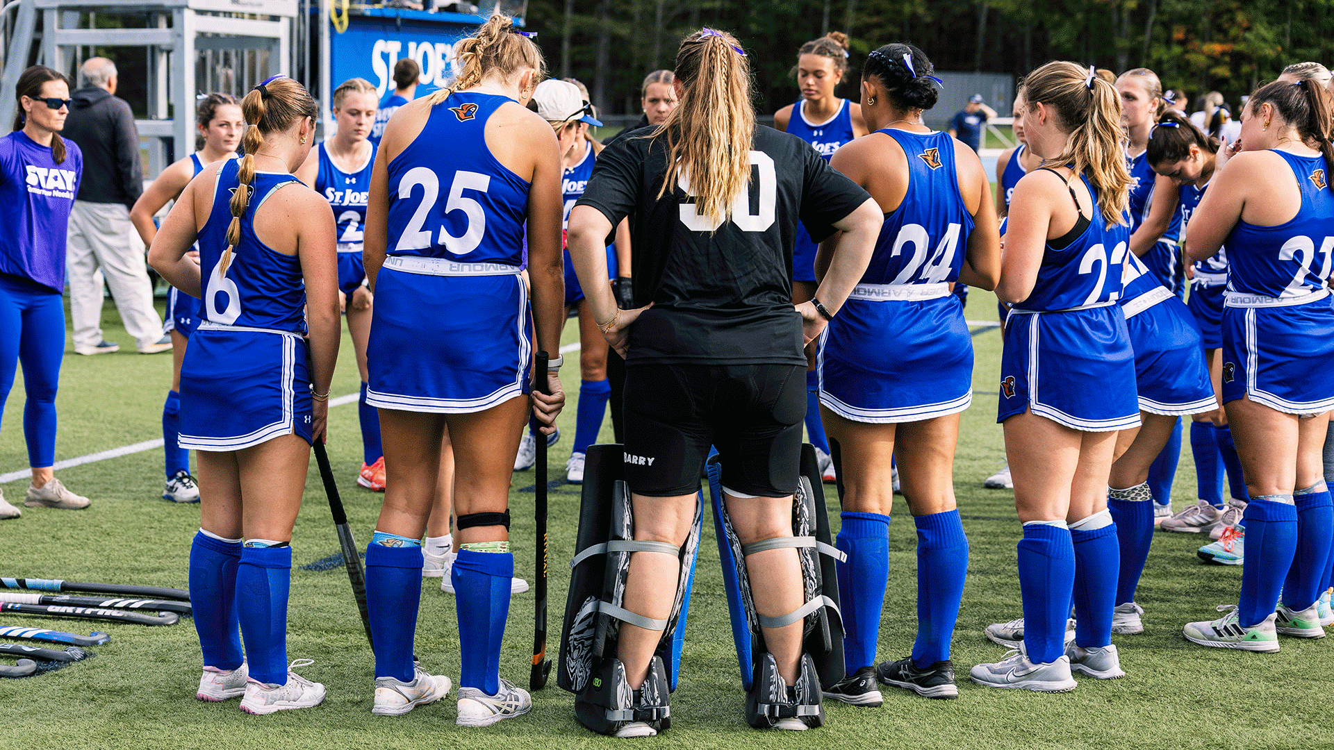 Field Hockey Team Huddle