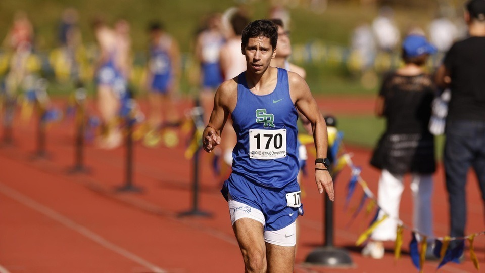 Patrick Voli finishes his race at the NEWMAC Championships