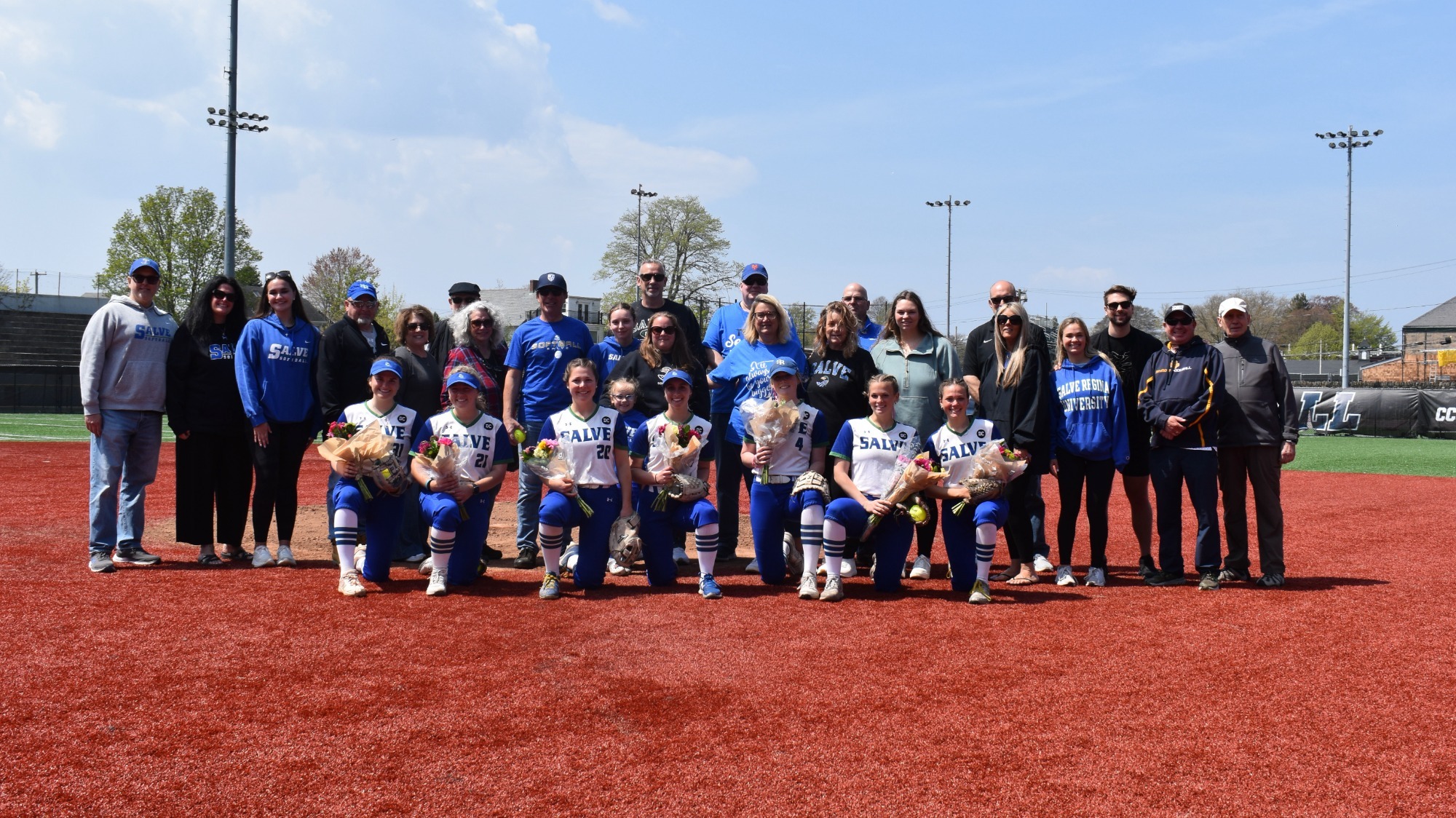 Seahawk seniors with their families before doubleheader versus the Pride