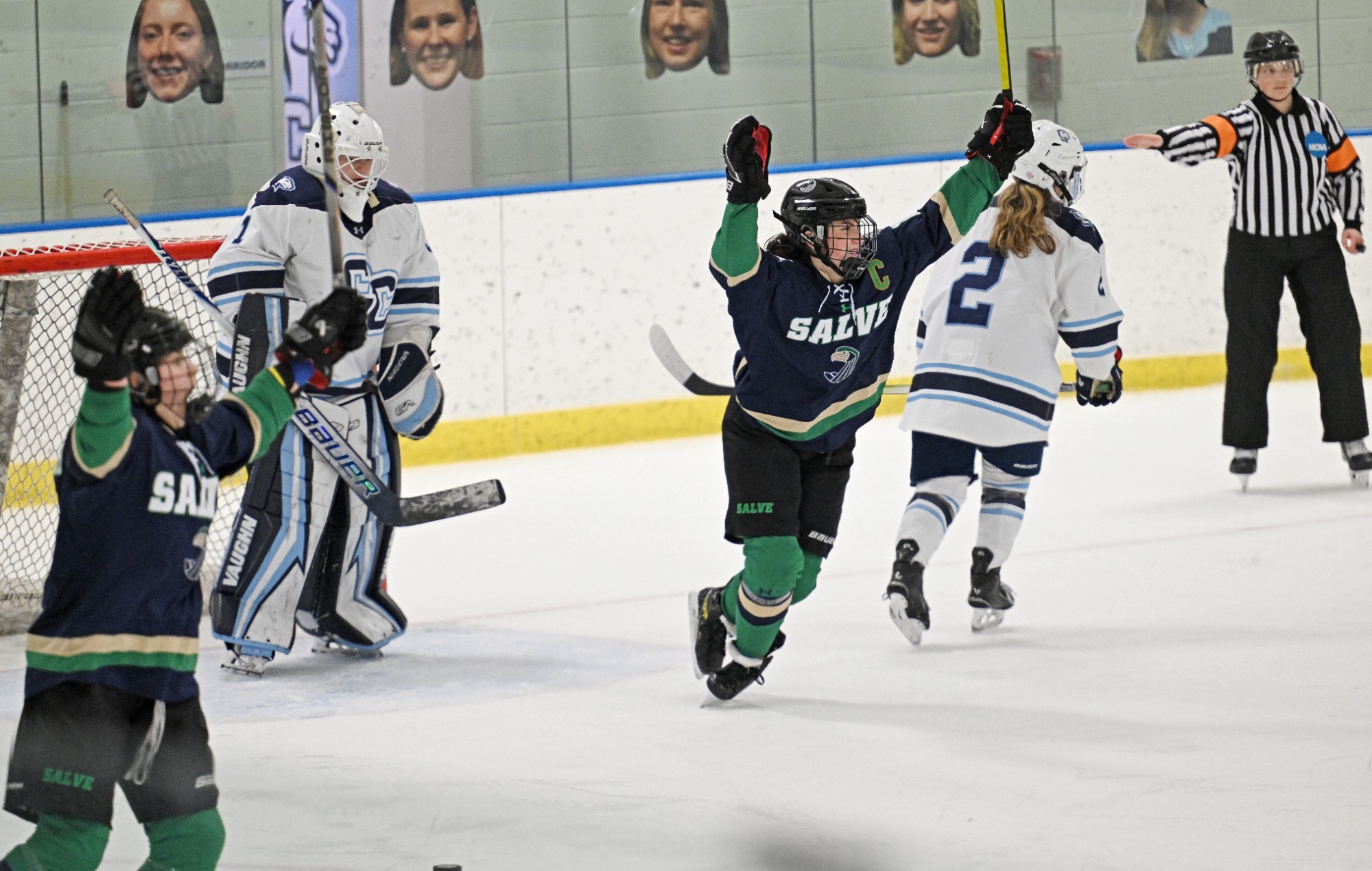 Women's ice hockey celebrates game winning goal against Conn College