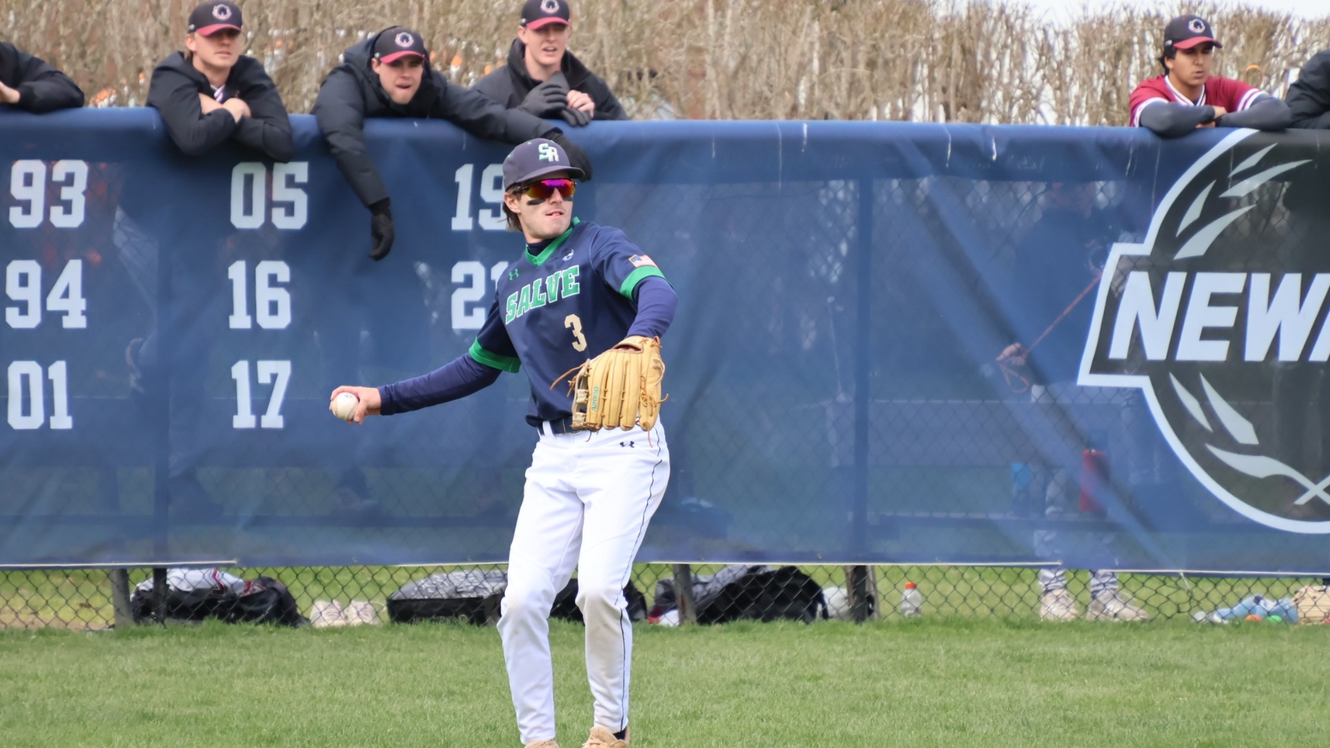 Evan O'Rourke patrols left field in front of the home and visiting bullpens