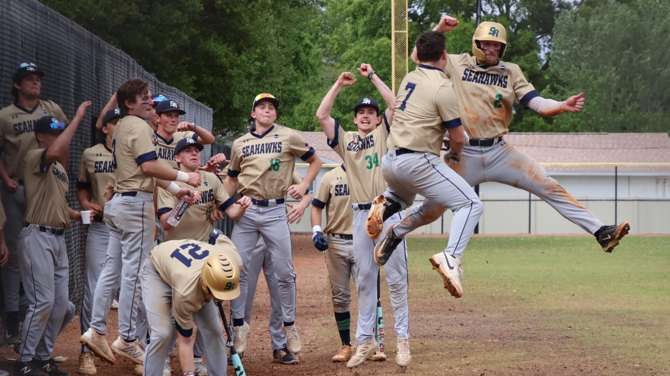 Shane Williams (#2) enjoys a celebration leap with fellow captain Brady Smolinski (#7)