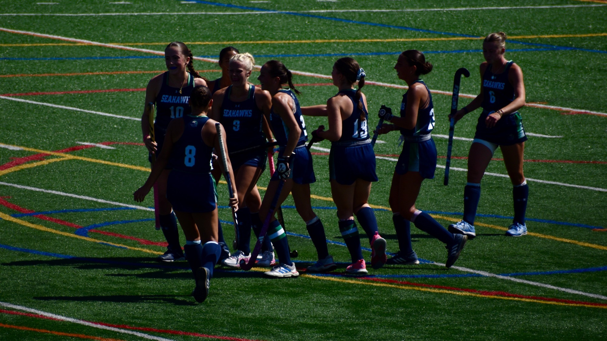 Catie Bell (#9) scores the tying goal in the second quarter; she added two assists in the fourth quarter