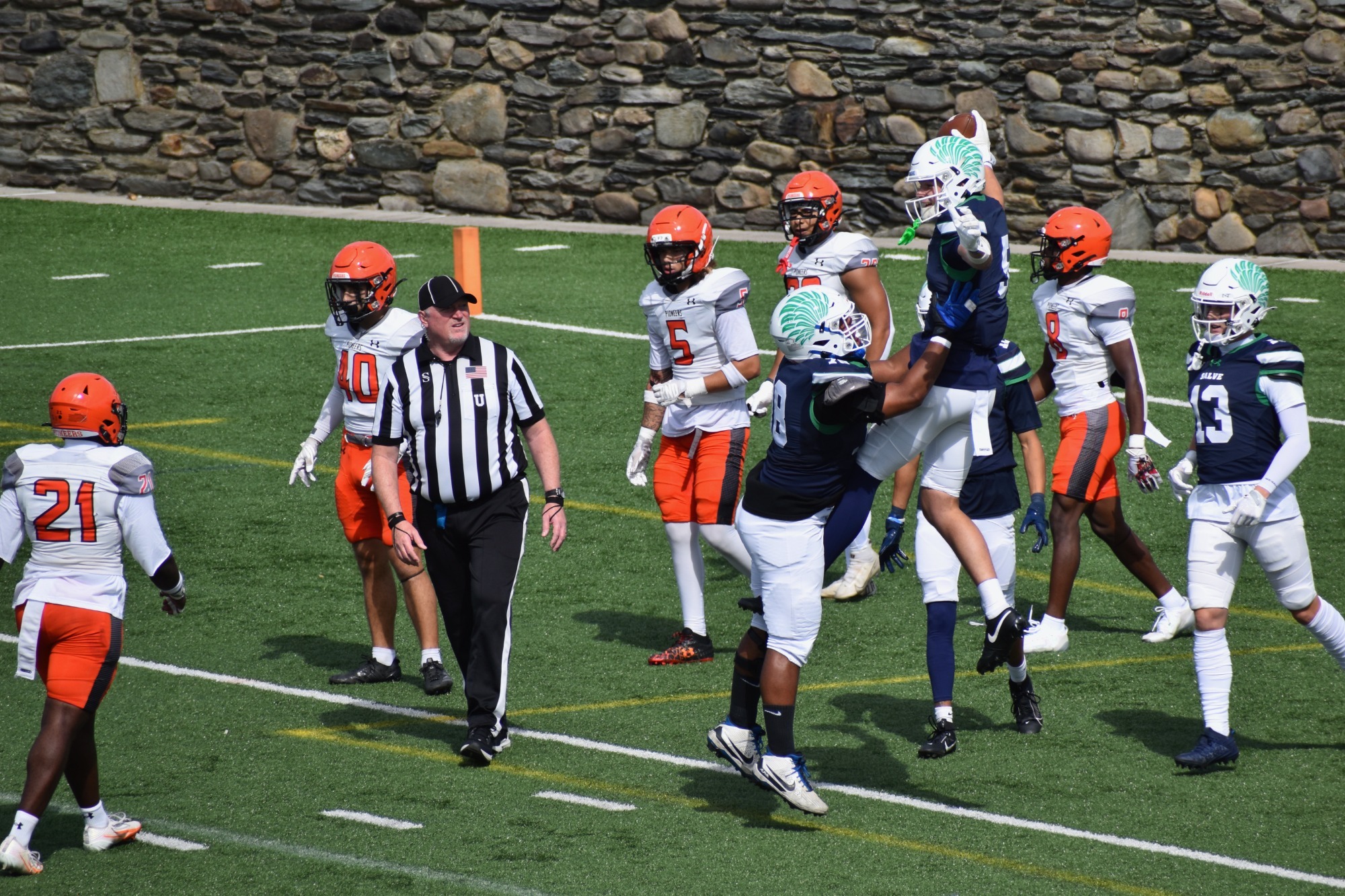 WR Spencer Chapman gets a lift from OL Krystian Reese after a first-quarter touchdown