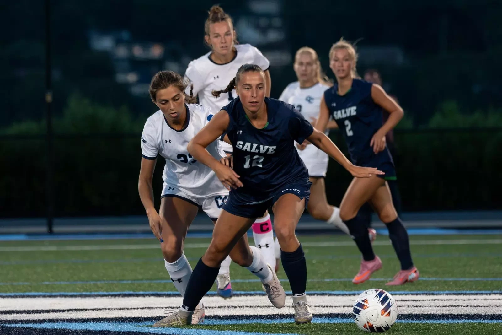 Olivia Tacconi tracks the ball at Connecticut College