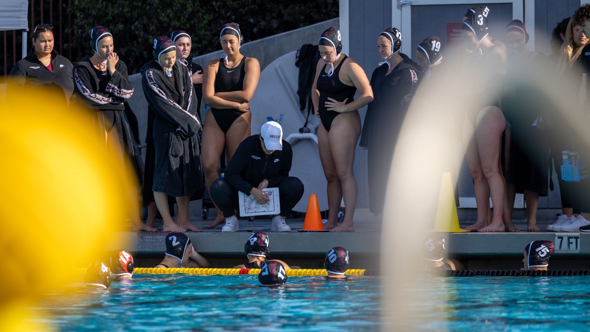 Claire Linney center of huddle vs UC Davis, 1-17-2026
