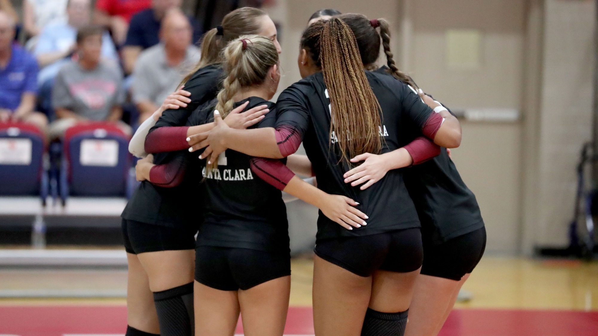 Volleyball huddle at Dayton, 8-29-2026