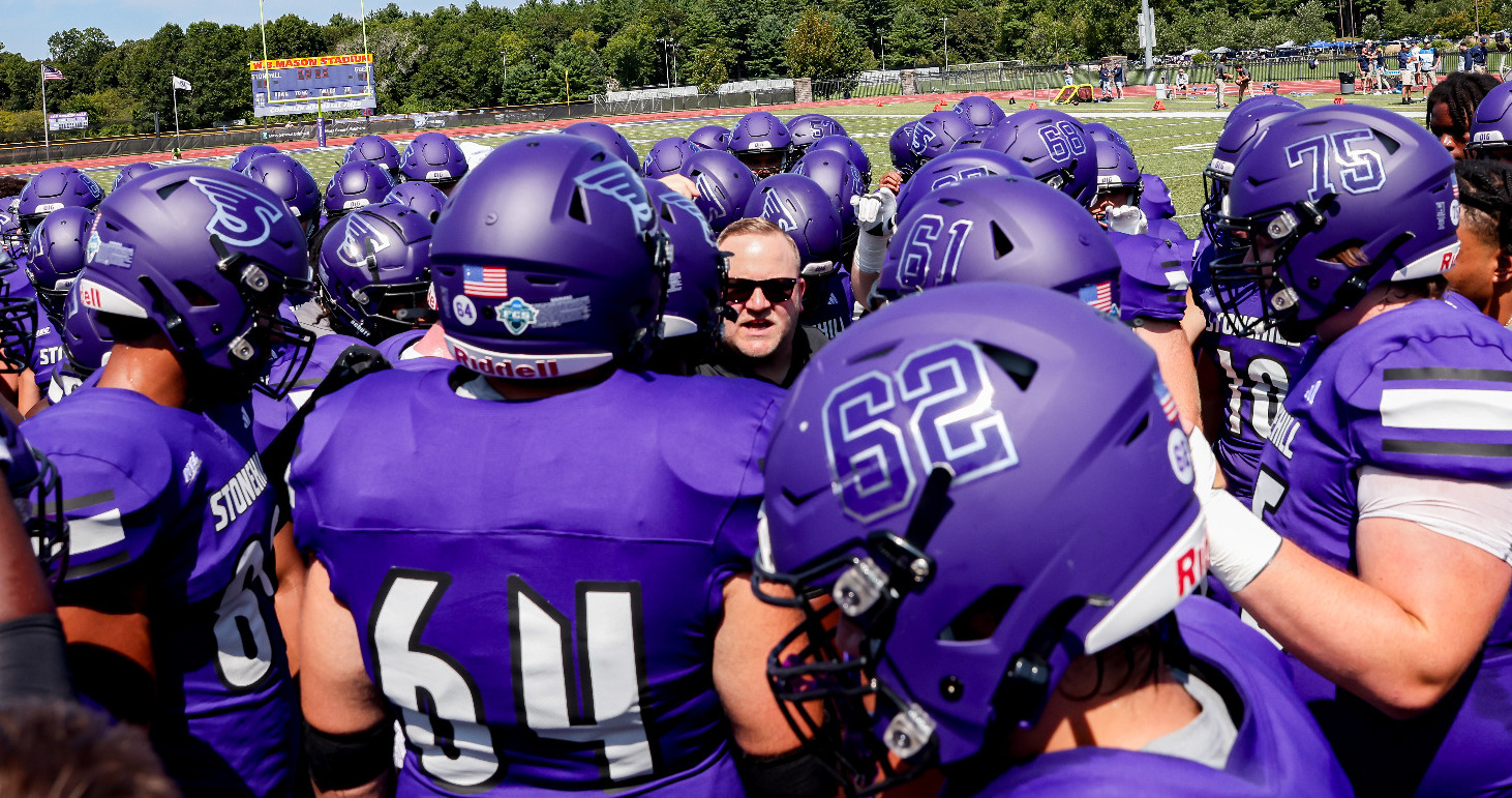 Football Huddle vs UNH