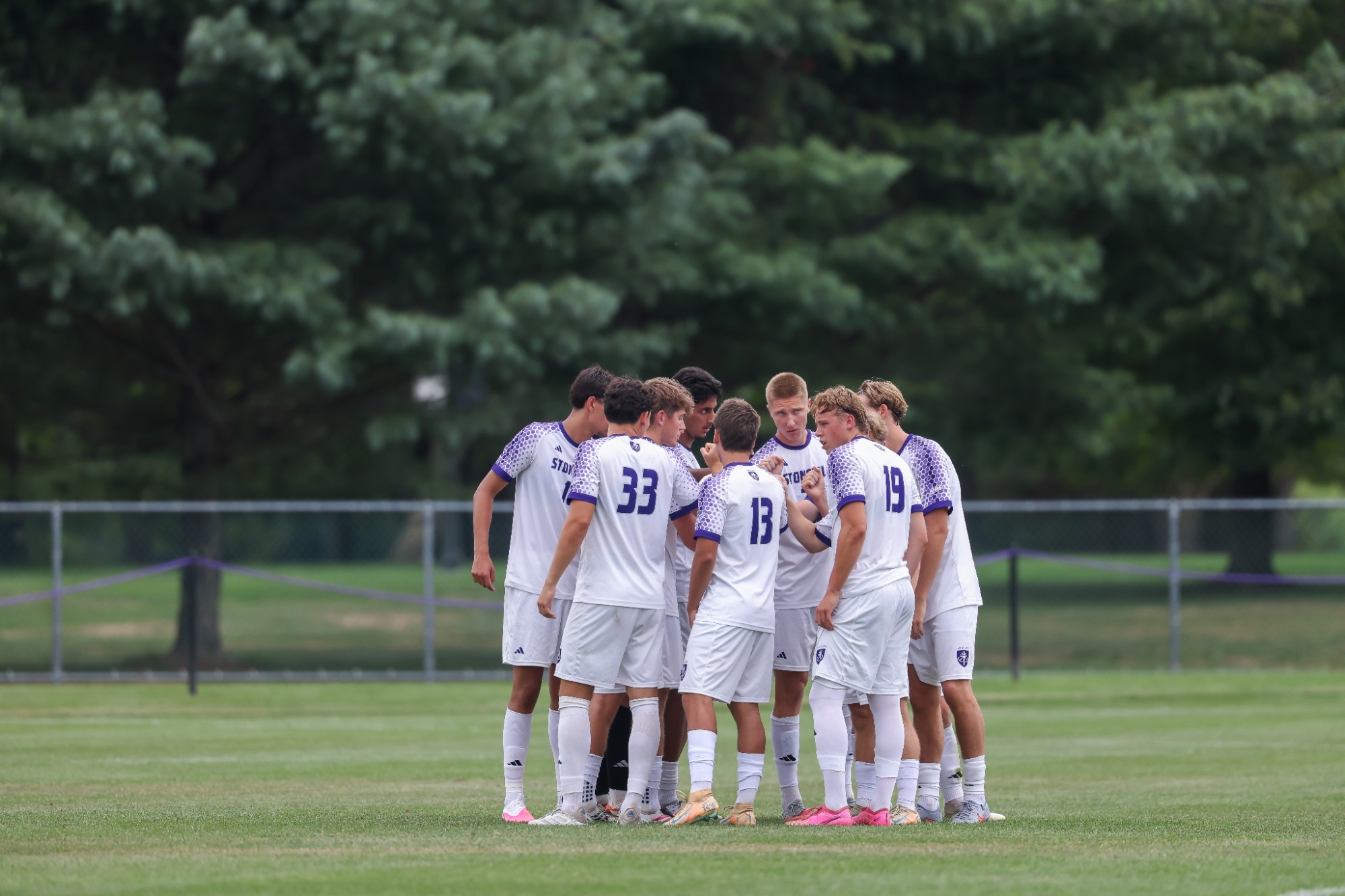 Men's Soccer Team Huddle