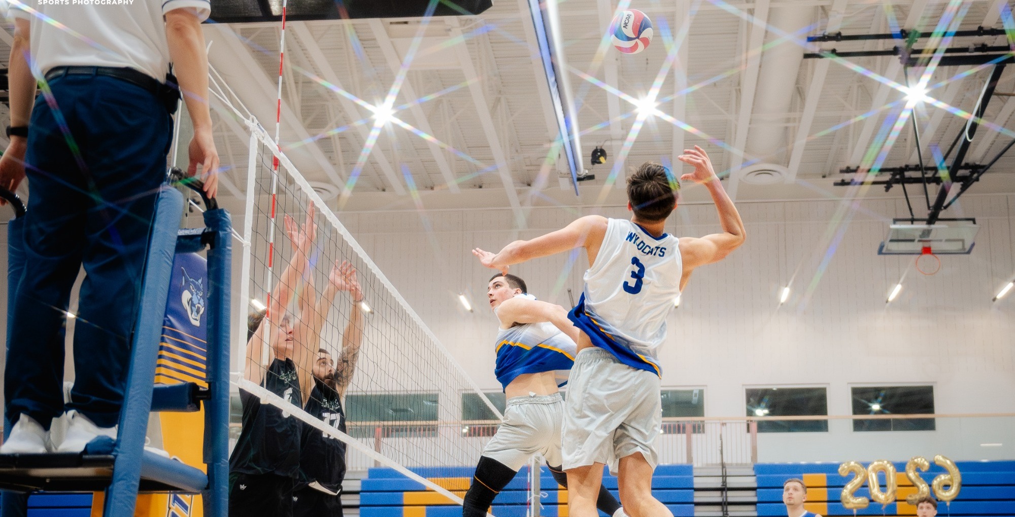 SUNY POLY VOLLEYBALL PLAYER MAKES EFFORT TO SECURE A POINT FOR THE TEAM