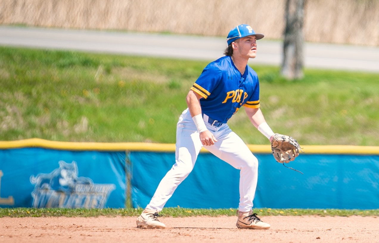 SUNY POLY baseball player gets set for potential ground ball