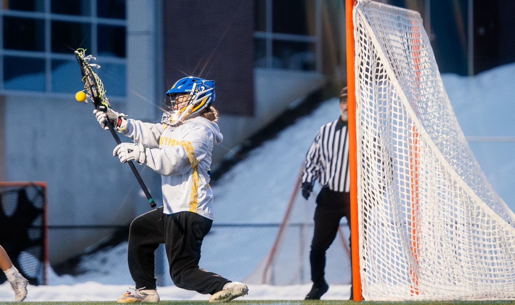 SUNY POLY Goalkeeper stops incoming shot from opposing team