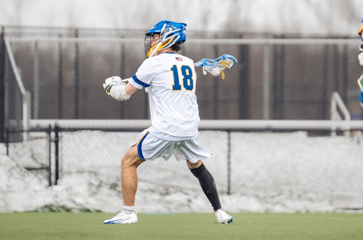 SUNY Poly lacrosse players loads up for a shot 
