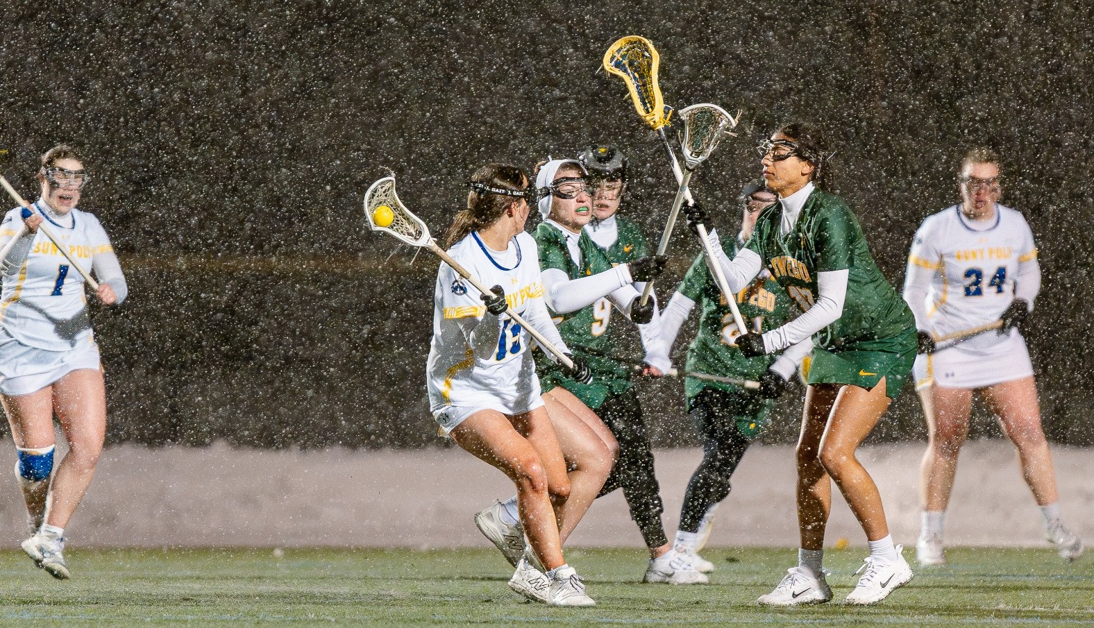 SUNY Poly women's lacrosse player observes the field for options