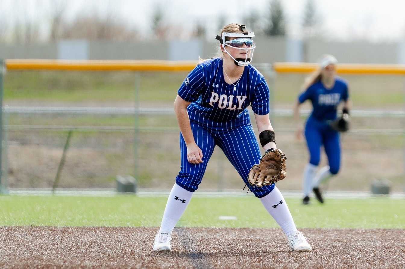 SUNY Poly softball player gets set in the field for potential incoming ball