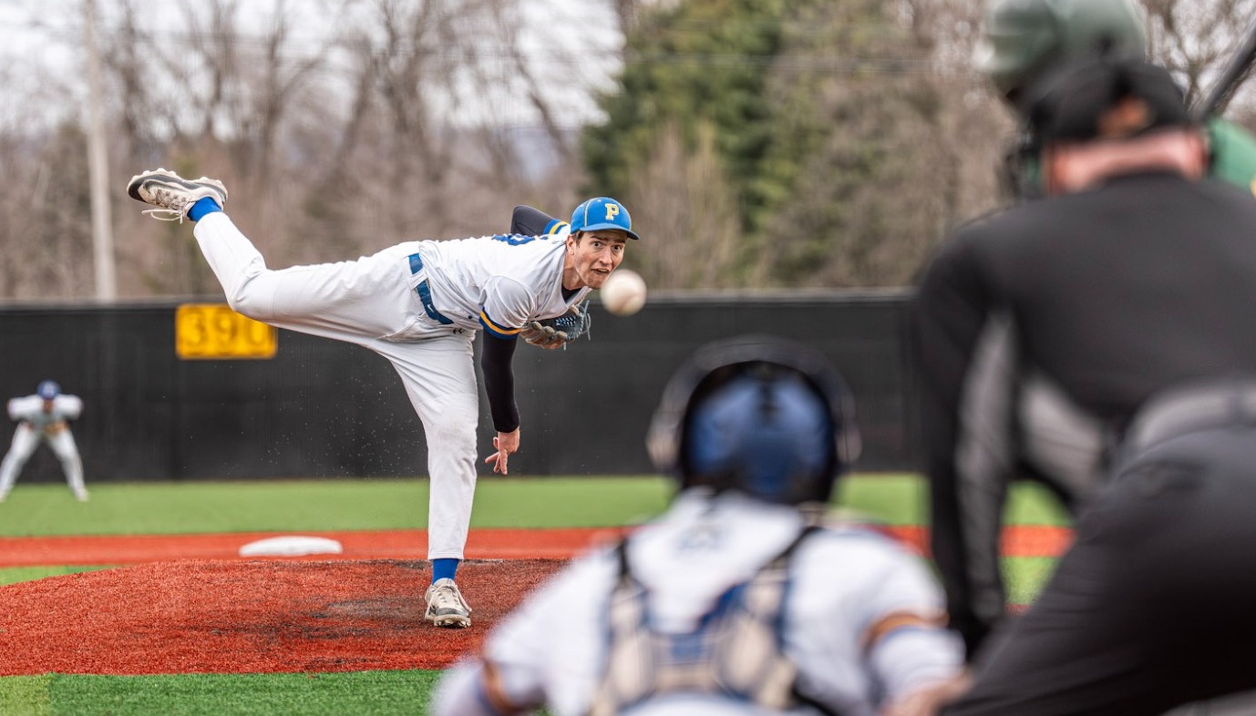 SUNY Poly pitcher delivers pitch to home plate