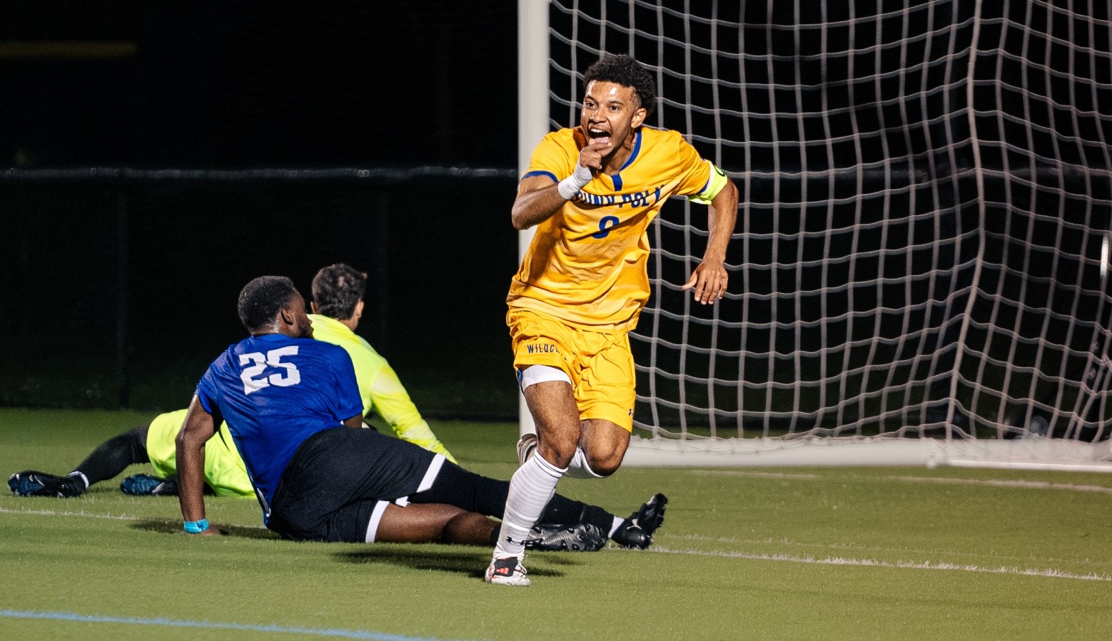 SUNY POLY men's soccer players celebrates after scoring eventual game winning goal late in the second half