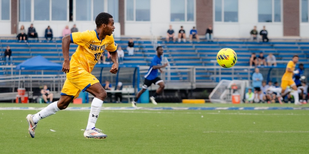 SUNY Poly men's soccer player tracks down thru ball from teammate