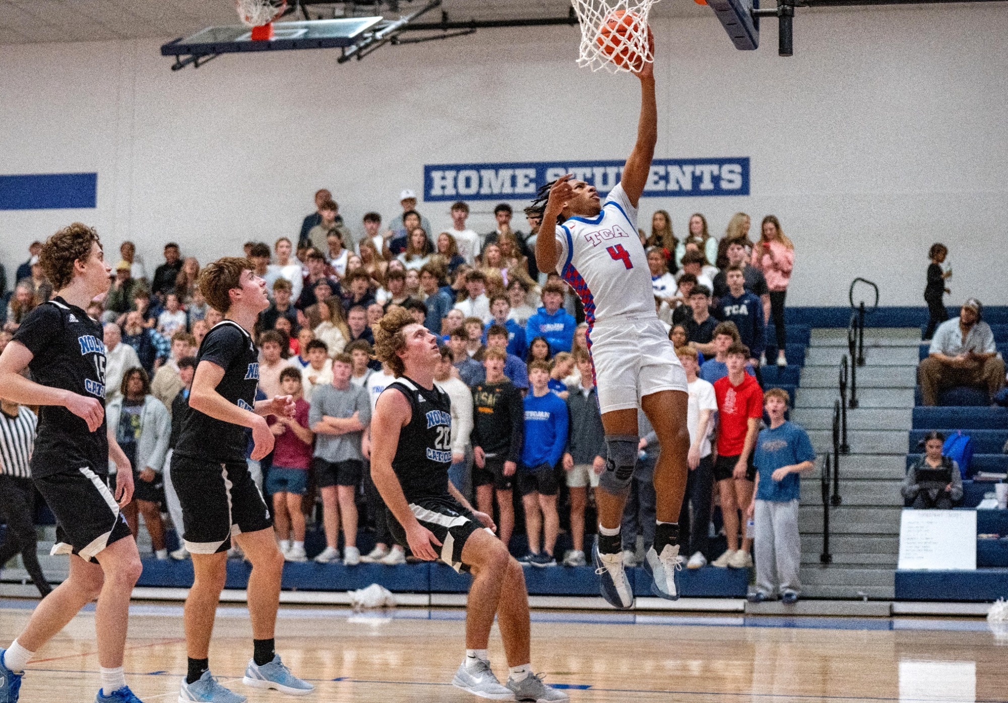 Trojans Topped by Parish