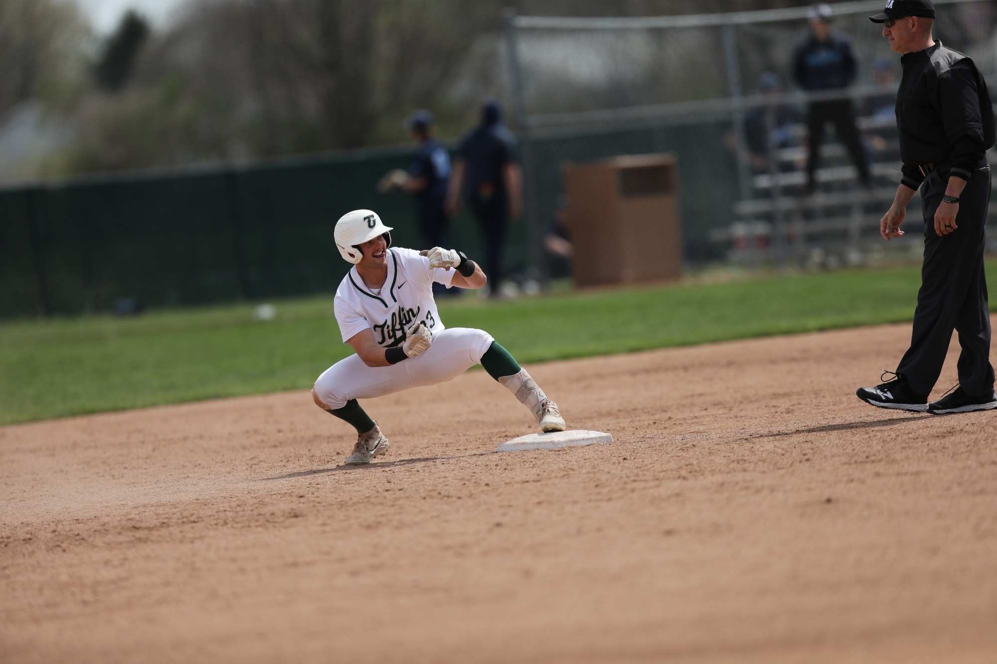 Griff Cady slides into seconds vs Northwood