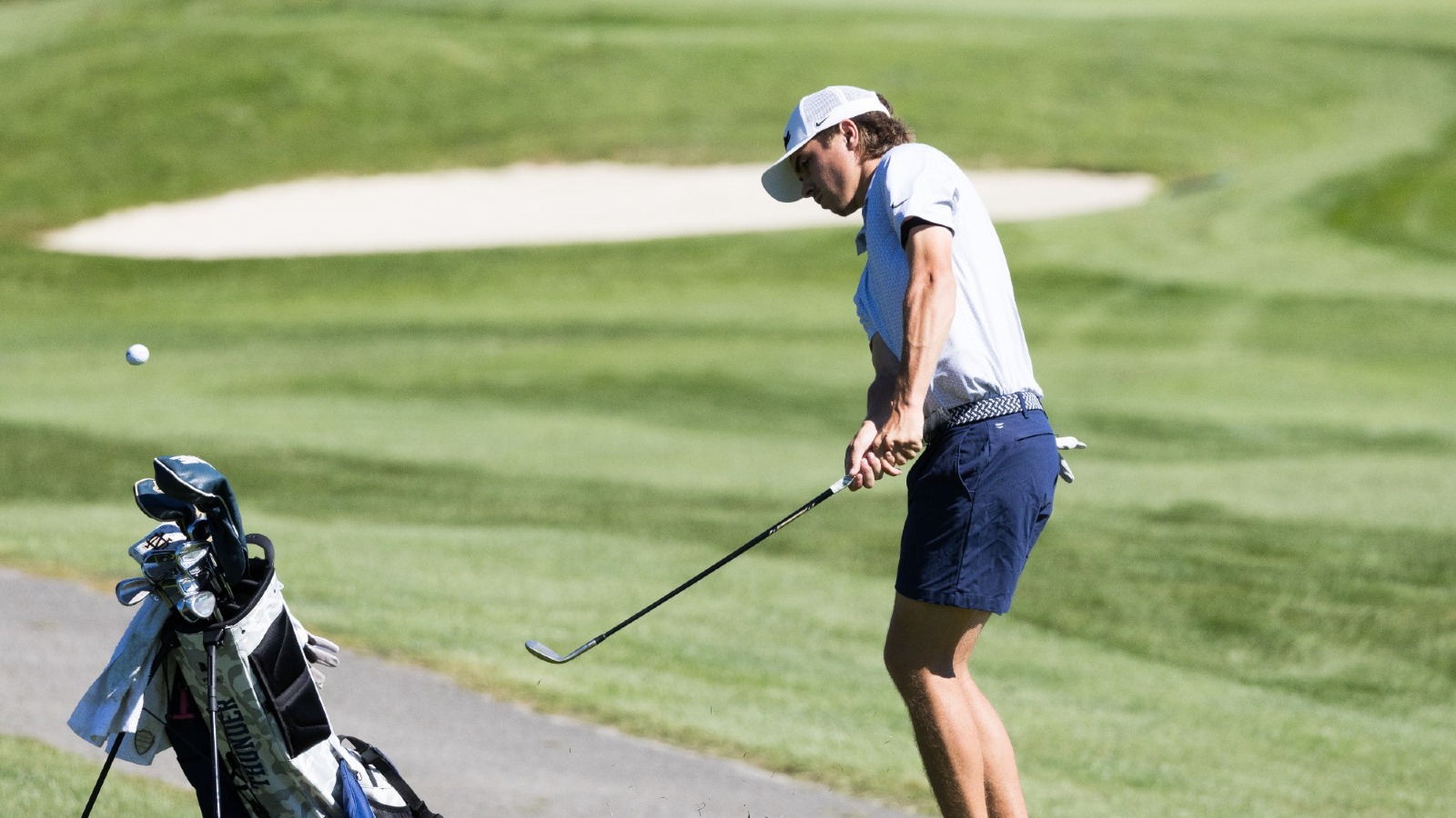 Jack Besner chips one on to the green