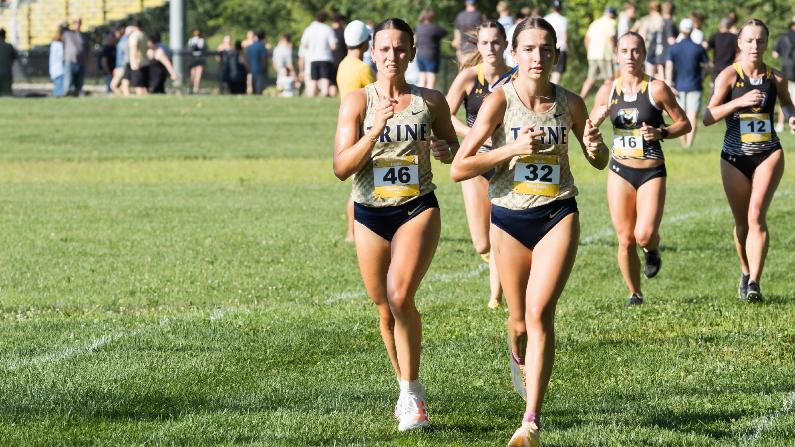 Grace Dubsky and Courtney Study run at the Manchester Invite