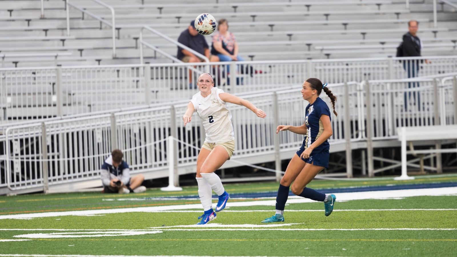 Kamryn Bowman battles for the ball
