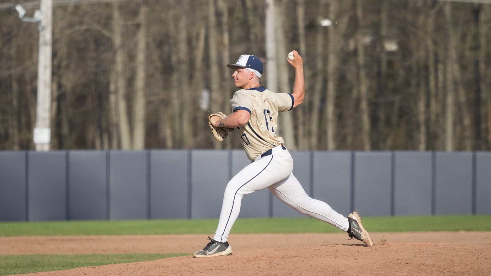 Trine pitcher Caden Hufnagle throws a pitch