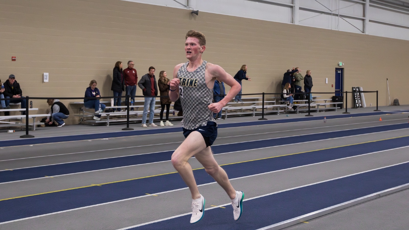 Max Van Huis runs a race at the MIAA Championships