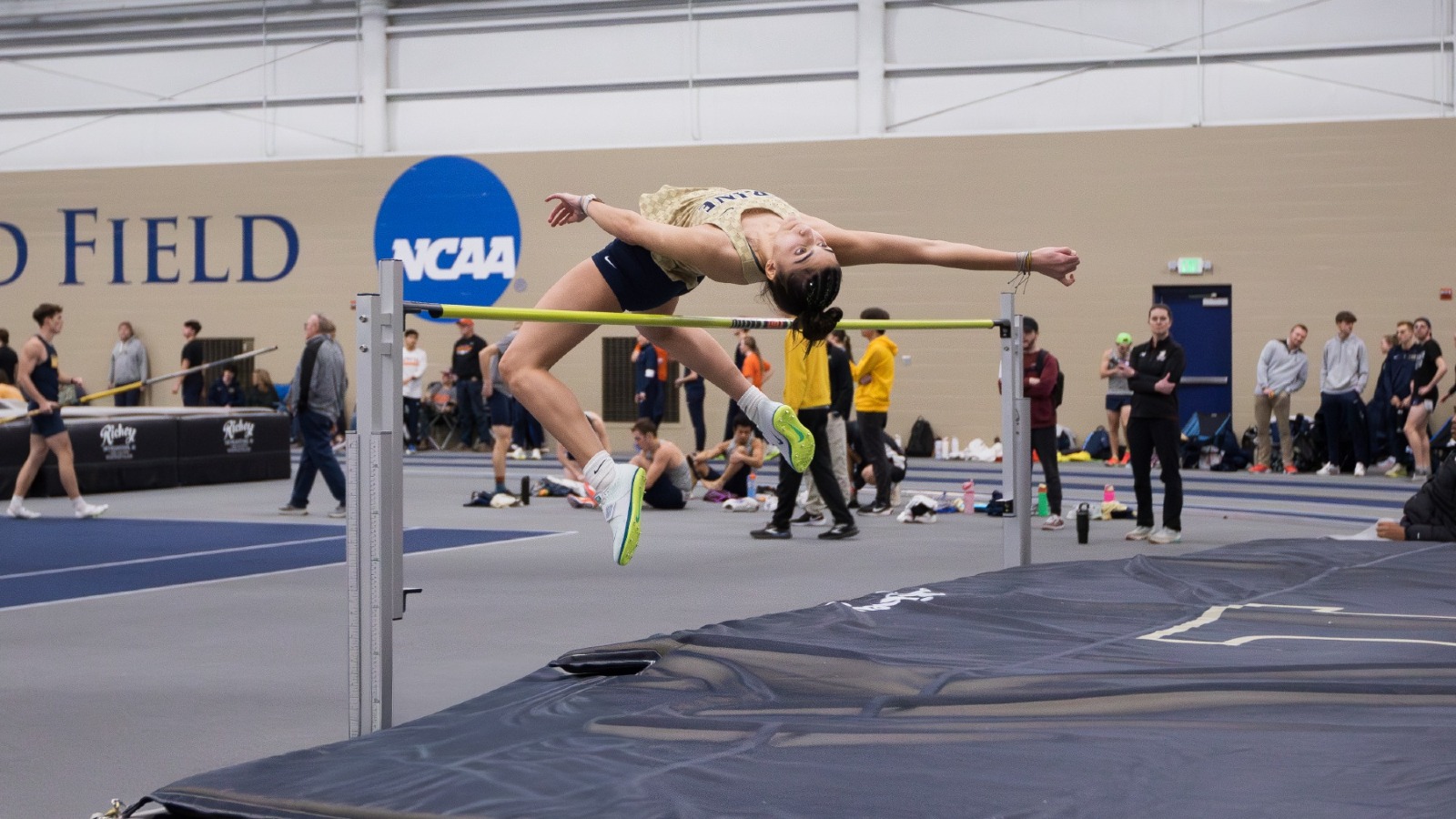 Hannah Flores Ness clears the bar in high jump