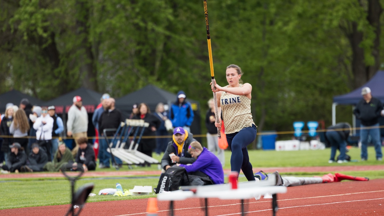 Olivia Andrews runs down the pole vault runway