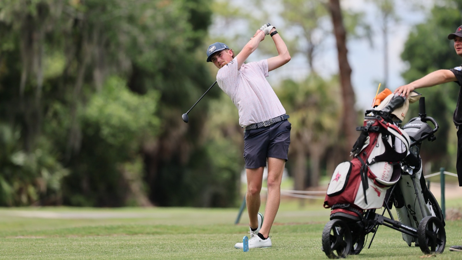 Garrett James swings his club at the NCAA Championships