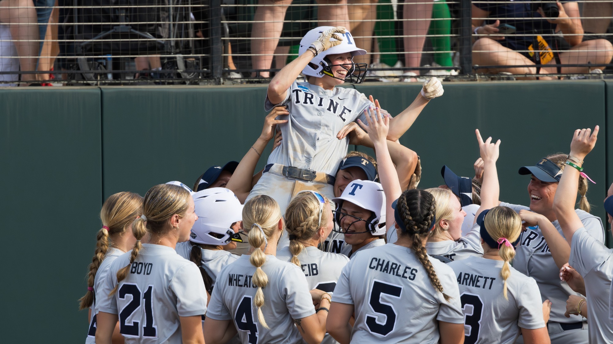 Huckeby lifted in celebration of walk off victory