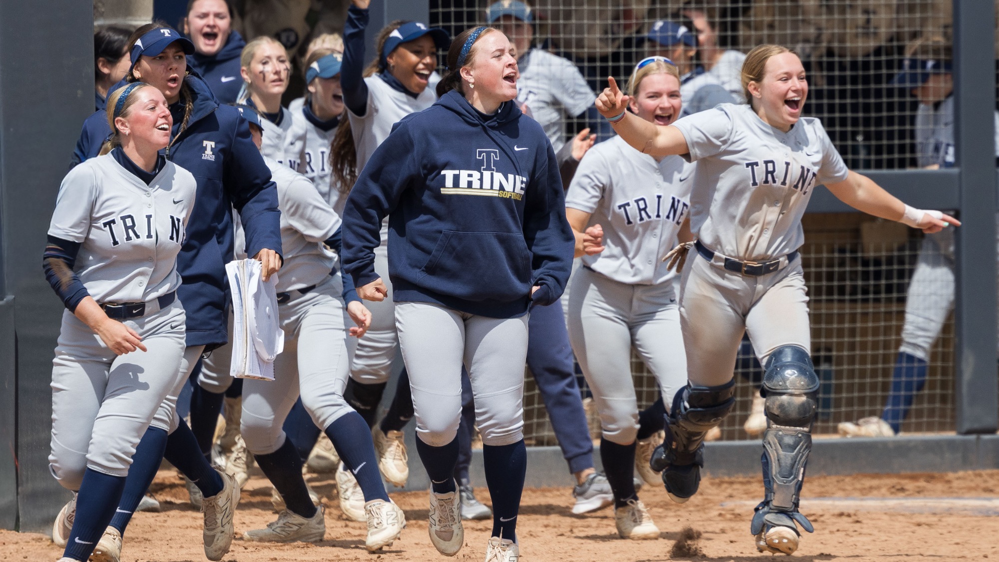 Softball celebrates walk off against Hope