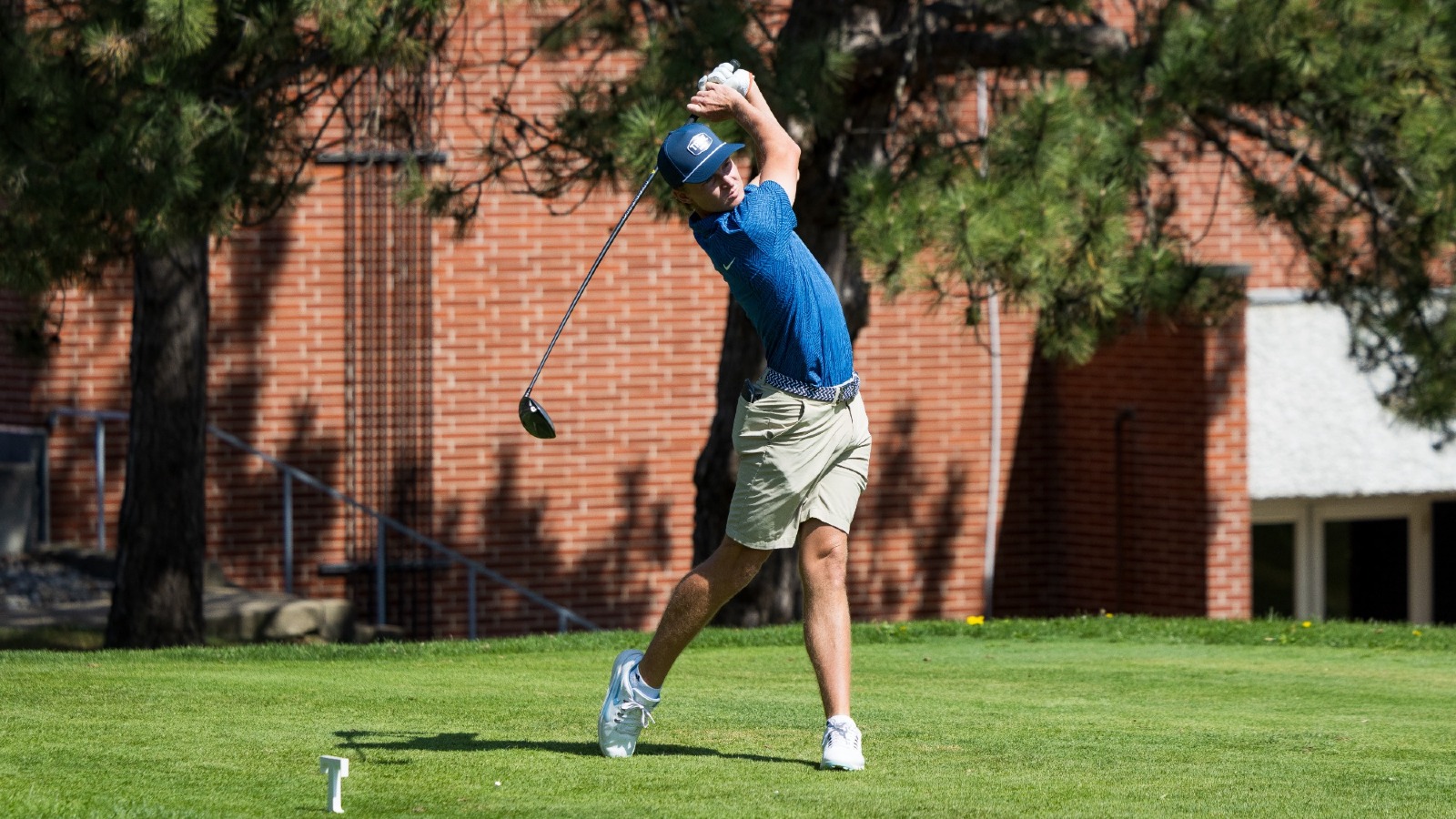 Jake Bilby drives the ball on the 10th hole at Zollner Golf Course