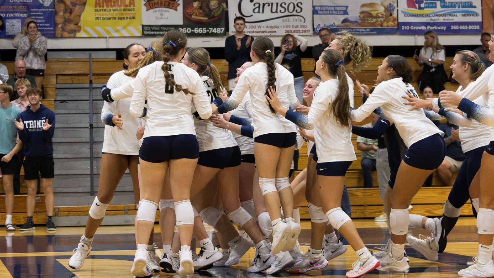 Women's Volleyball team celebrates the win over Puerto Rico Rio Piedras