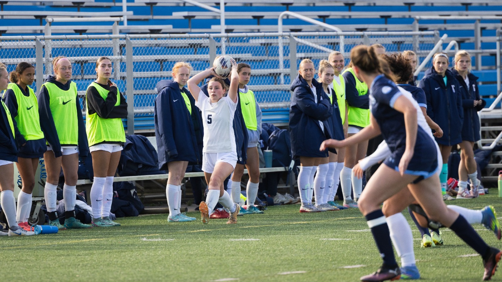 Maggie McDowell throws the ball into play