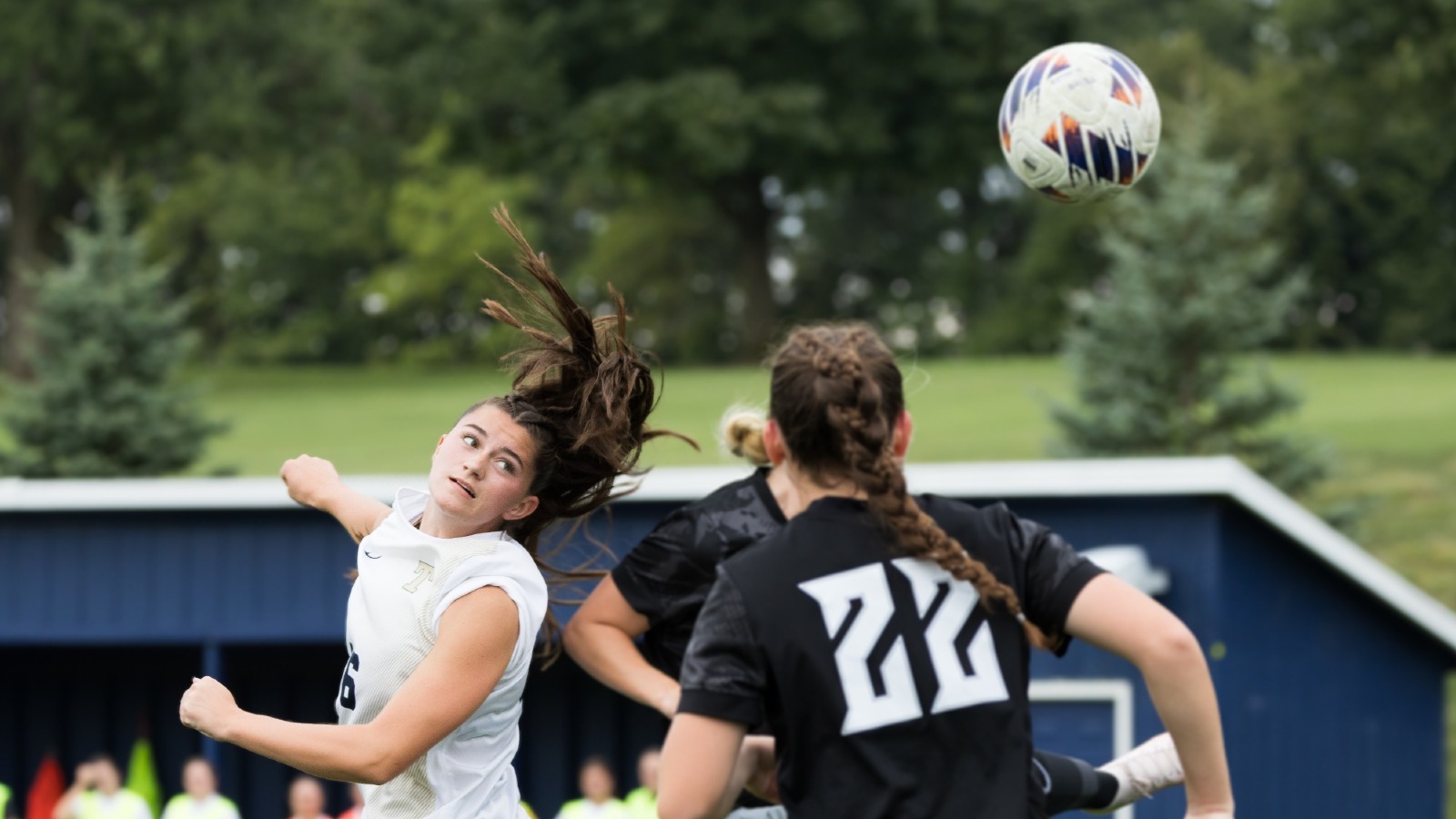 Elly McClelland heads the ball into the goal