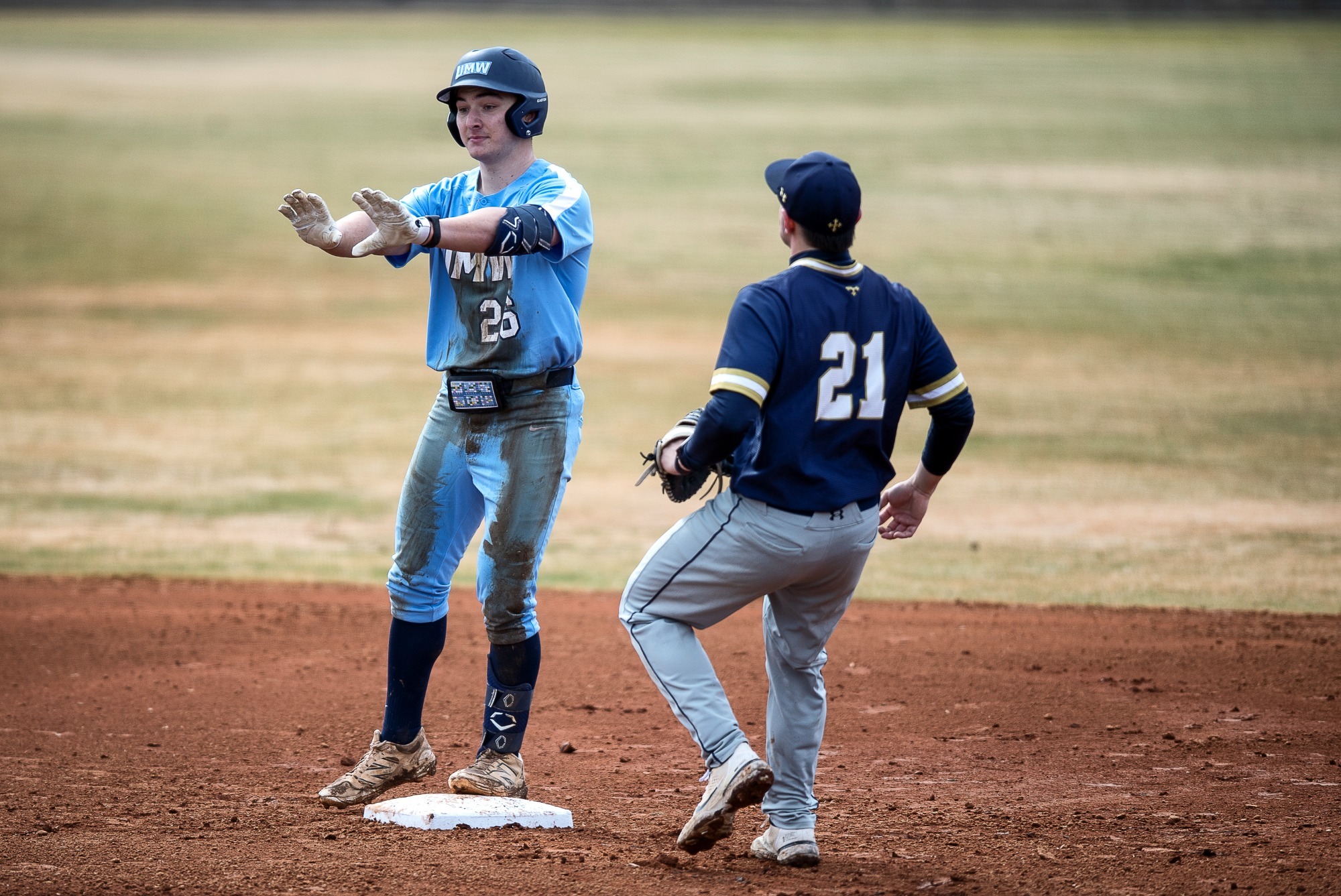 Eric Powell stands on second base